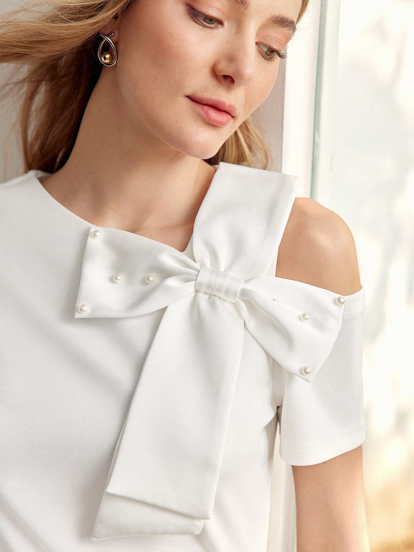 CM-TS070099 Women Casual Seoul Style Asymmetrical Shoulder Faux Pearl Bow Detail Shirt - White