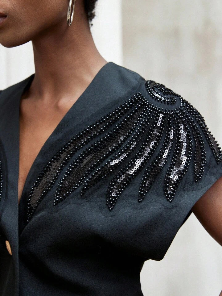 CM-TS354339 Women Elegant Seoul Style Asymmetrical Hem V-Neck Padded Beaded Embroidered Blouse - Black