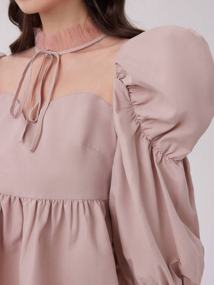 CM-TS544142 Women Elegant Seoul Style Mock Neck Knot Contrast Mesh Ruffle Hem Blouse