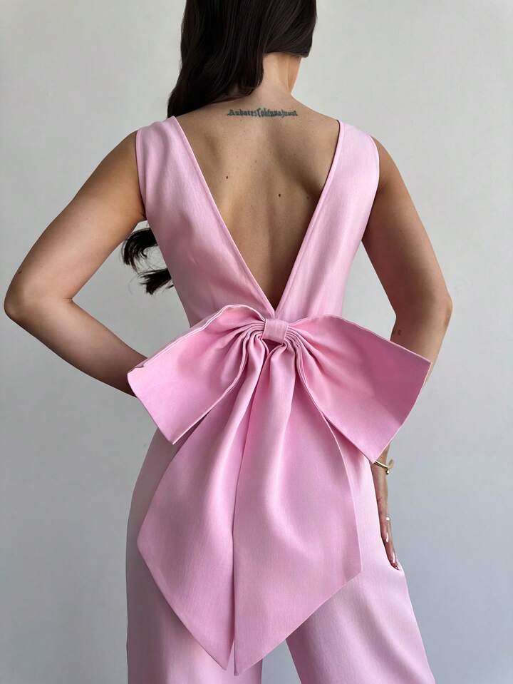CM-JS255200 Women Elegant Seoul Style Deep V-Neck Sleeveless Backless Bow Loose Straight Jumpsuit