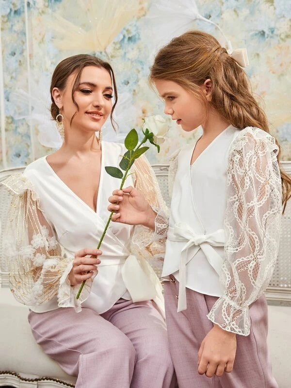 CM-TS117184 Women Elegant Seoul Style Surplice Neck Contrast Lace Tie Side Blouse