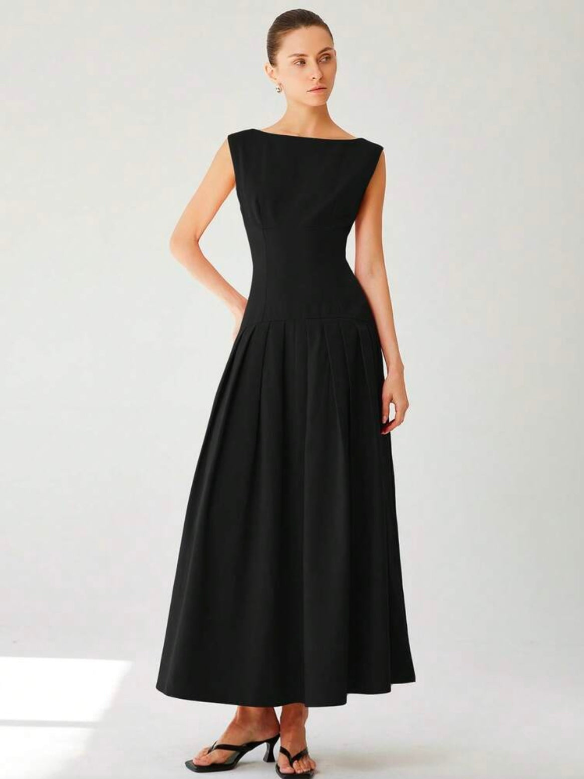 CM-DS136373 Women Elegant Seoul Style Sleeveless Cinched Waist Low Waist Pleated Ruffle Hem Long Dress - Black