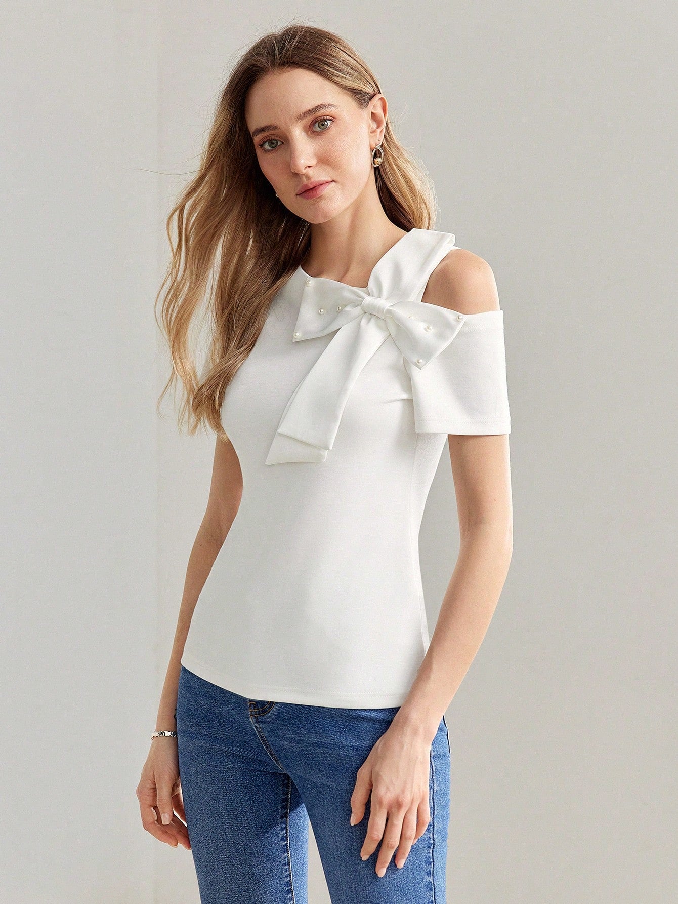 CM-TS070099 Women Casual Seoul Style Asymmetrical Shoulder Faux Pearl Bow Detail Shirt - White
