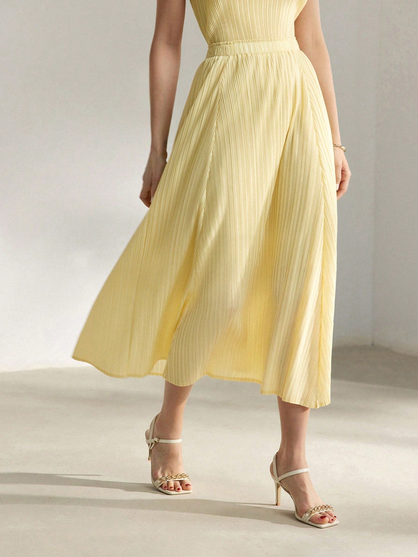 CM-BS333023 Women Elegant Seoul Style Solid Elastic Waist Plisse Midi Skirt - Yellow