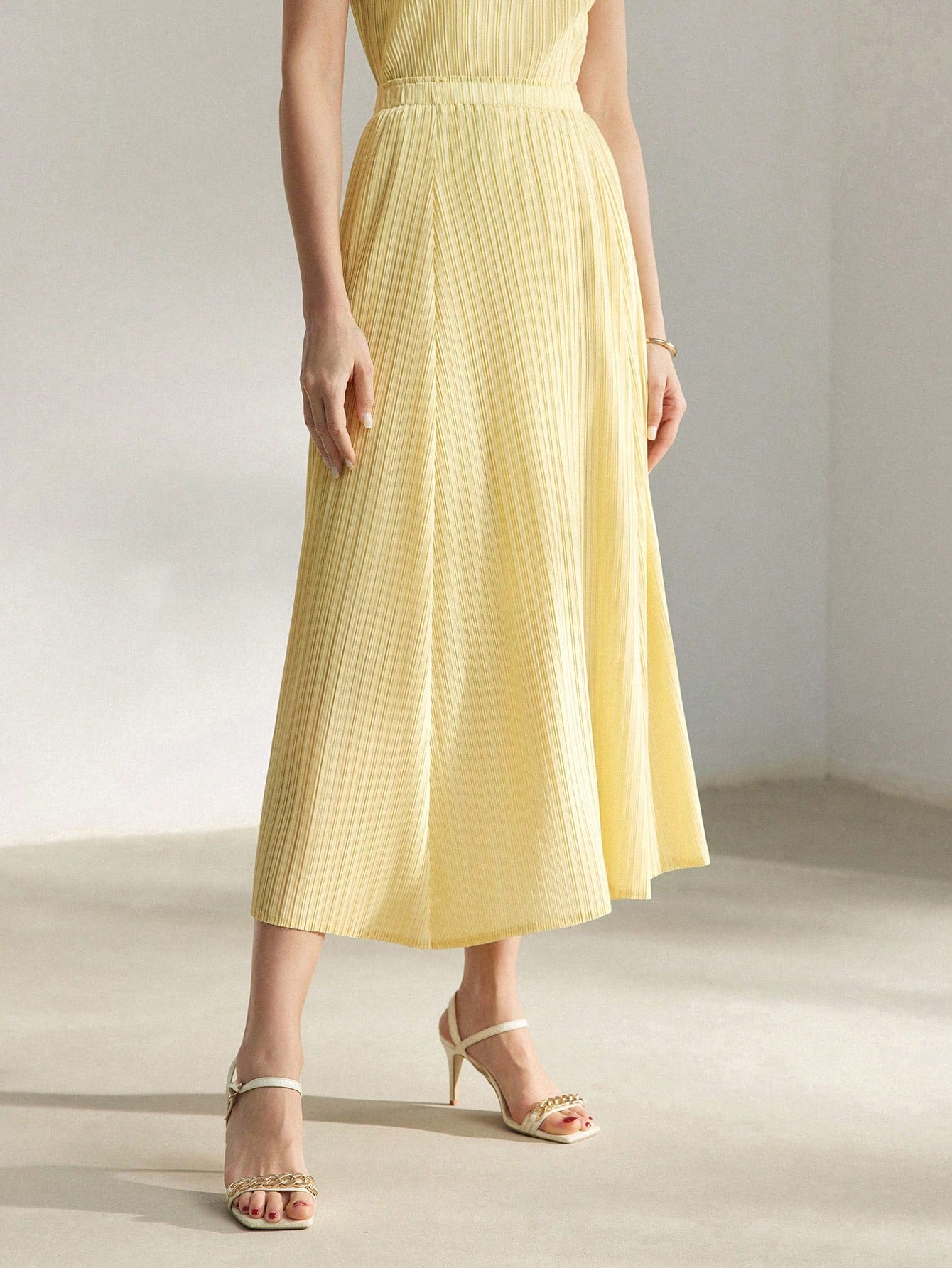 CM-BS333023 Women Elegant Seoul Style Solid Elastic Waist Plisse Midi Skirt - Yellow