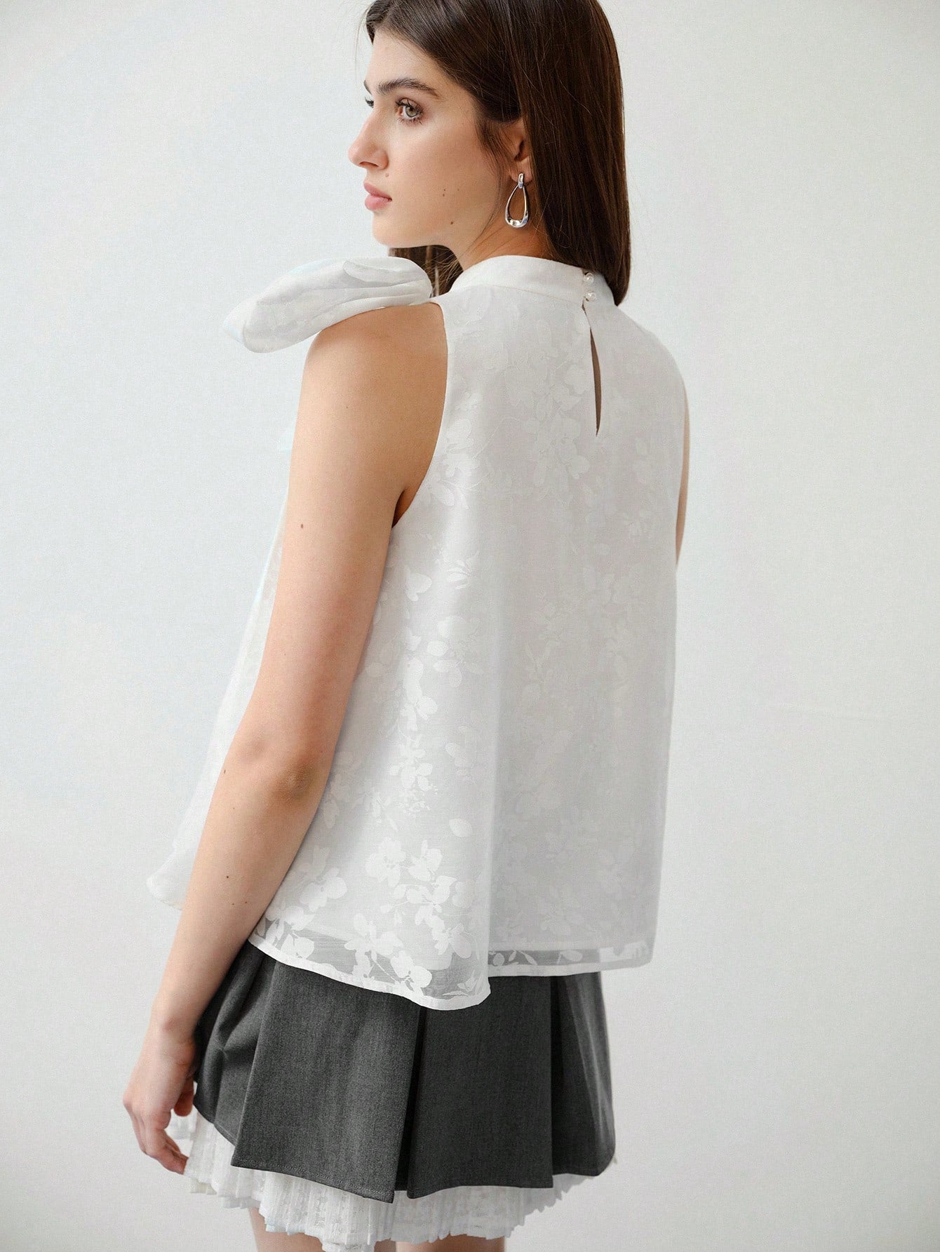 CM-TS113722 Women Elegant Seoul Style Stand Collar Bow Decor Sleeveless Blouse - White