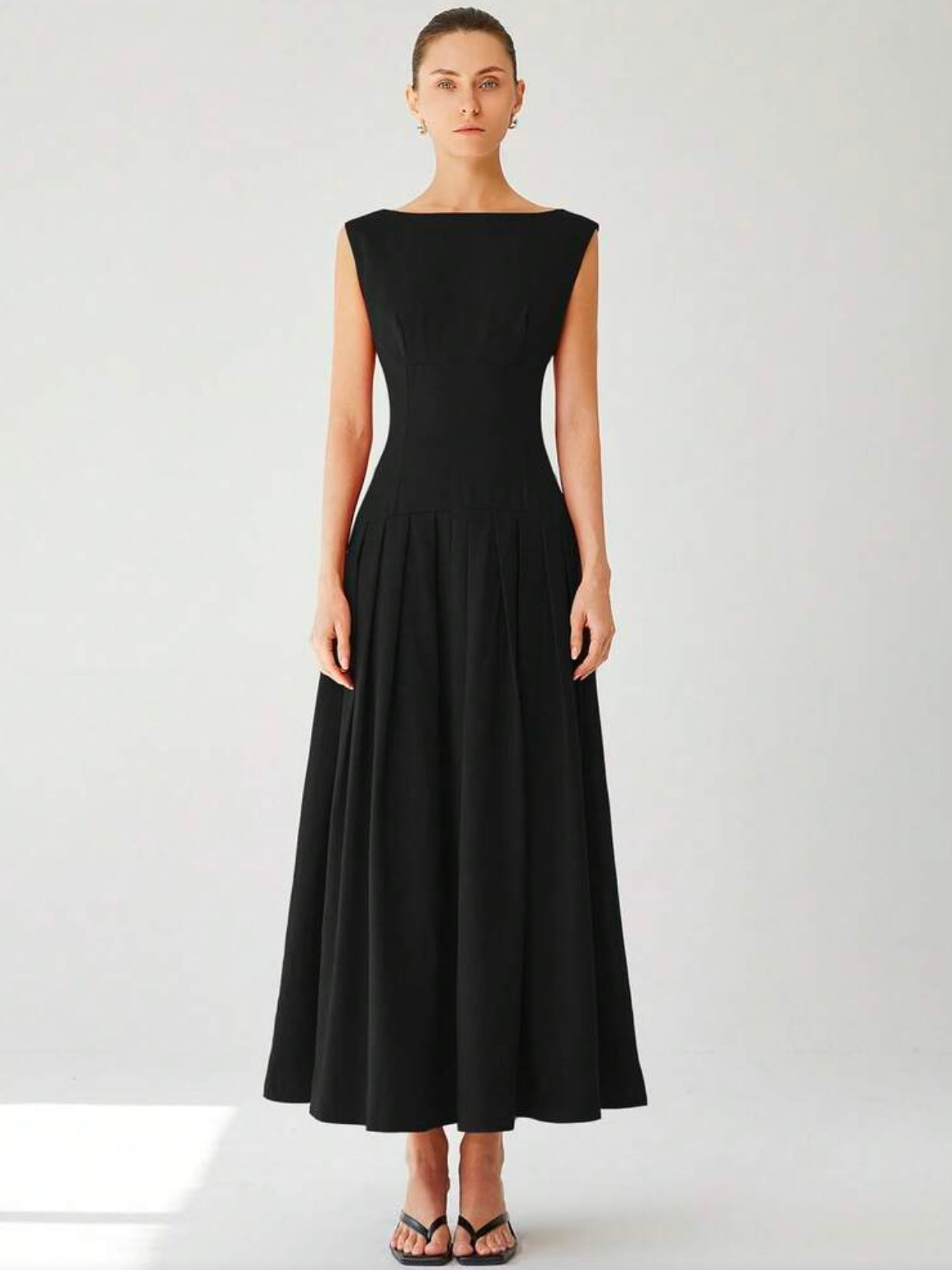 CM-DS136373 Women Elegant Seoul Style Sleeveless Cinched Waist Low Waist Pleated Ruffle Hem Long Dress - Black