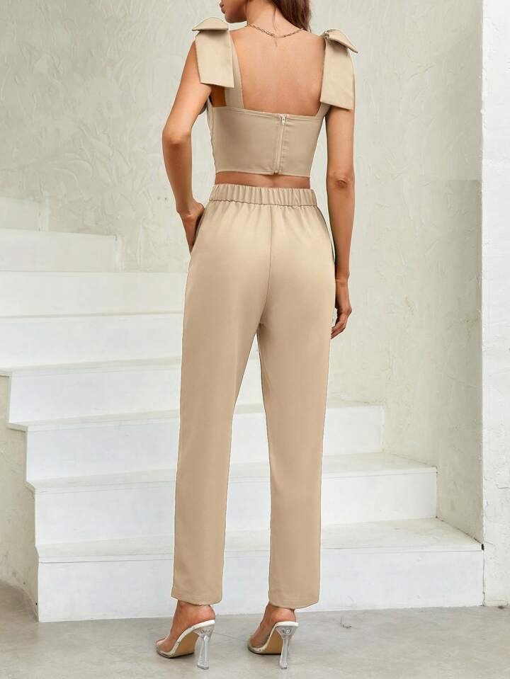 CM-SS505335 Women Casual Seoul Style Bowknot Detail Cut Off Shoulder Top With Slanted Pocket Pants - Set