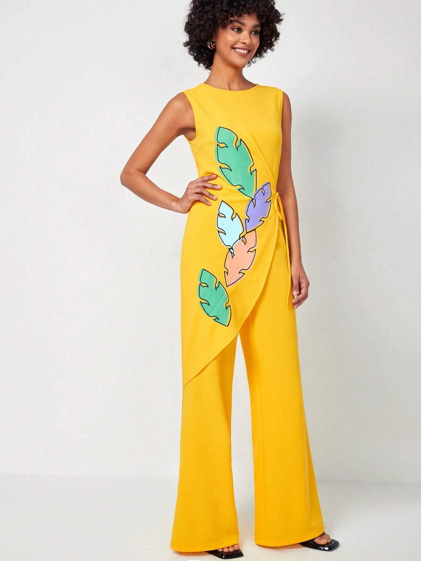 CM-JS322230 Women Elegant Seoul Style Leaf Print Knot Side Wrap Hem Tank Jumpsuit