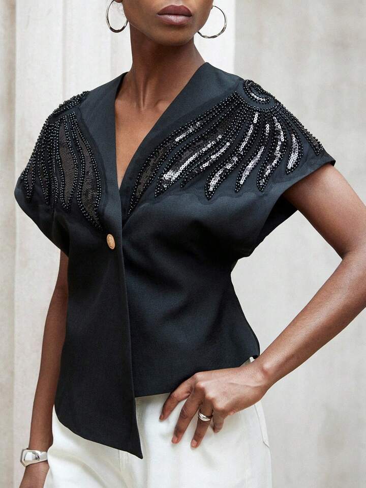 CM-TS354339 Women Elegant Seoul Style Asymmetrical Hem V-Neck Padded Beaded Embroidered Blouse - Black