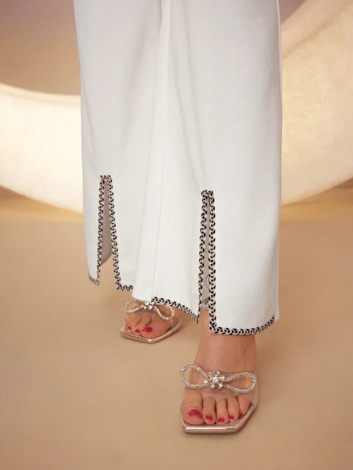 CM-BS606360 Women Elegant Seoul Style Pearl-Inspired Button Detail Flared Pants - White