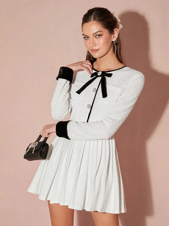 CM-DS977384 Women Elegant Seoul Style Bow Decor Round Neck Long Sleeve Pleated Hem Mini Dress - White