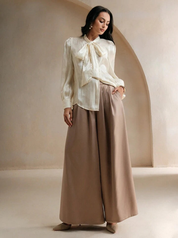 CM-TS379258 Women Elegant Seoul Style Tie Neck Pearl Knot Loose Long Sleeve Blouse - Apricot