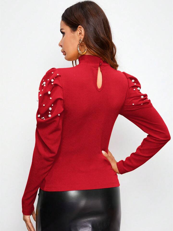 CM-TS829069 Women Casual Seoul Style Mock-Neck Pearl Beaded Leg-of-Mutton Sleeve Top - Red