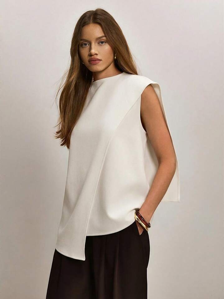 CM-TS563755 Women Elegant Seoul Style Stand Collar Sleeveless Asymmetric Hem Loose Blouse - Beige