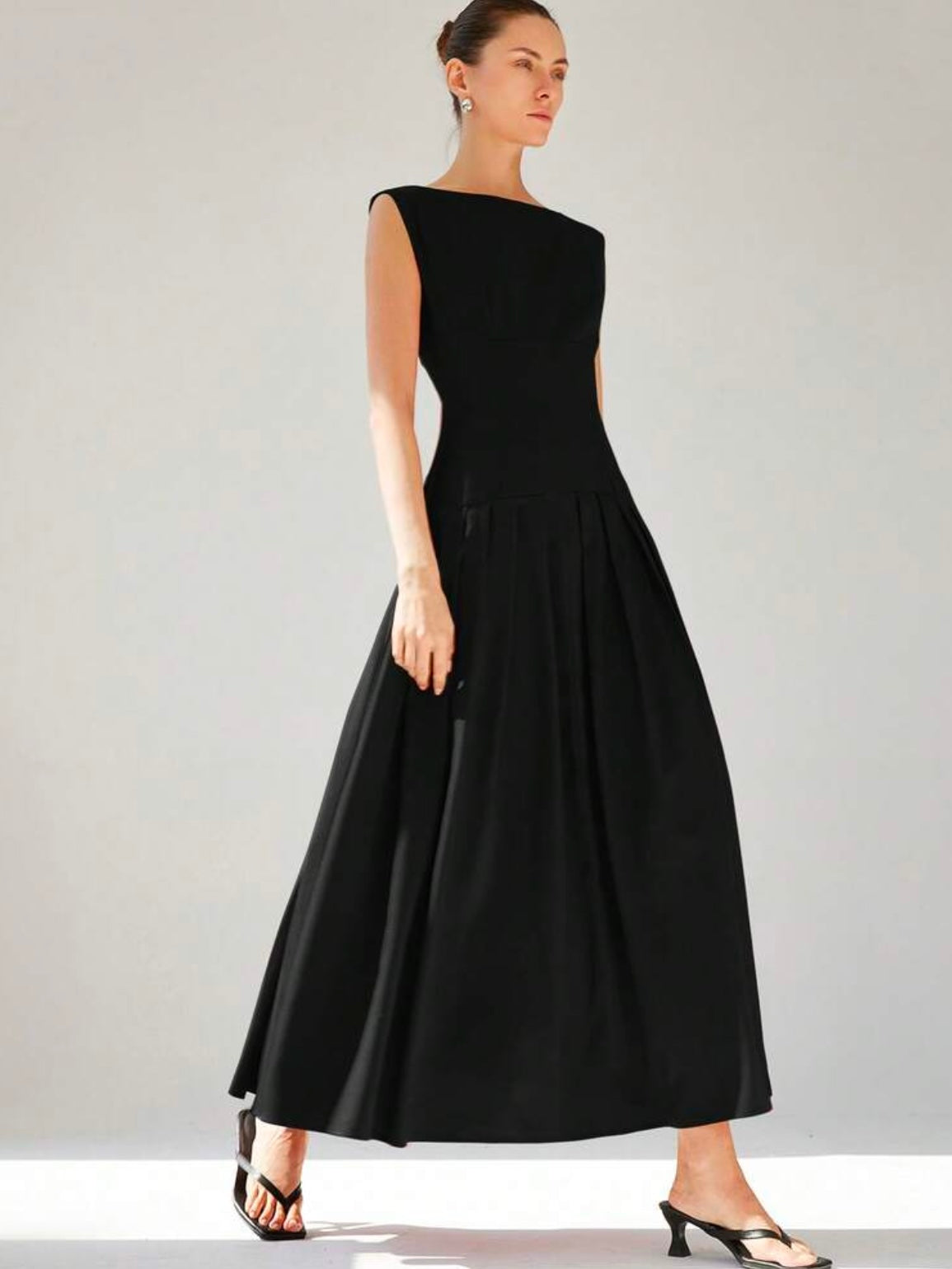 CM-DS136373 Women Elegant Seoul Style Sleeveless Cinched Waist Low Waist Pleated Ruffle Hem Long Dress - Black