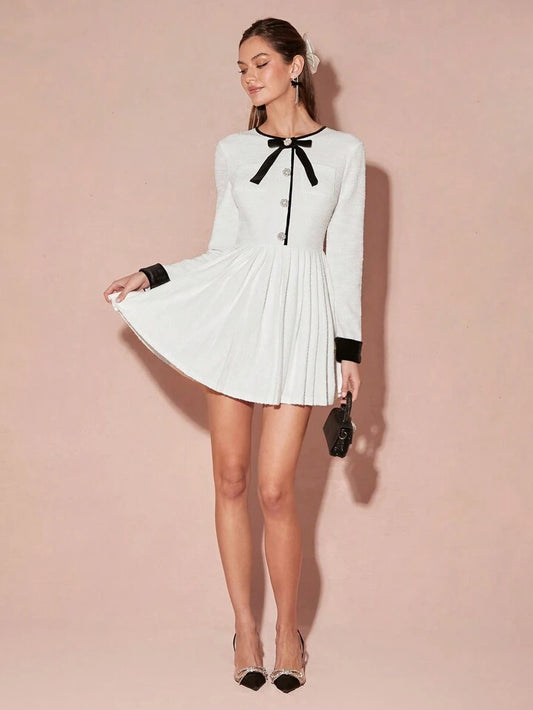 CM-DS977384 Women Elegant Seoul Style Bow Decor Round Neck Long Sleeve Pleated Hem Mini Dress - White