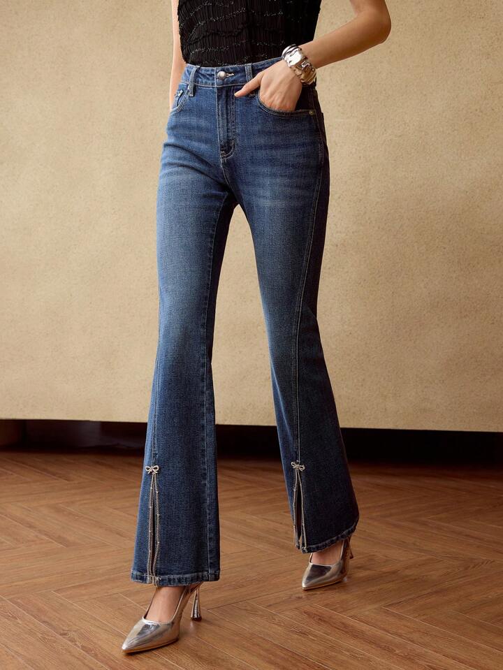 CM-BS671797 Women Elegant Seoul Style Rhinestone Bow Chain Detail Split Hem Flare Leg Denim Jeans