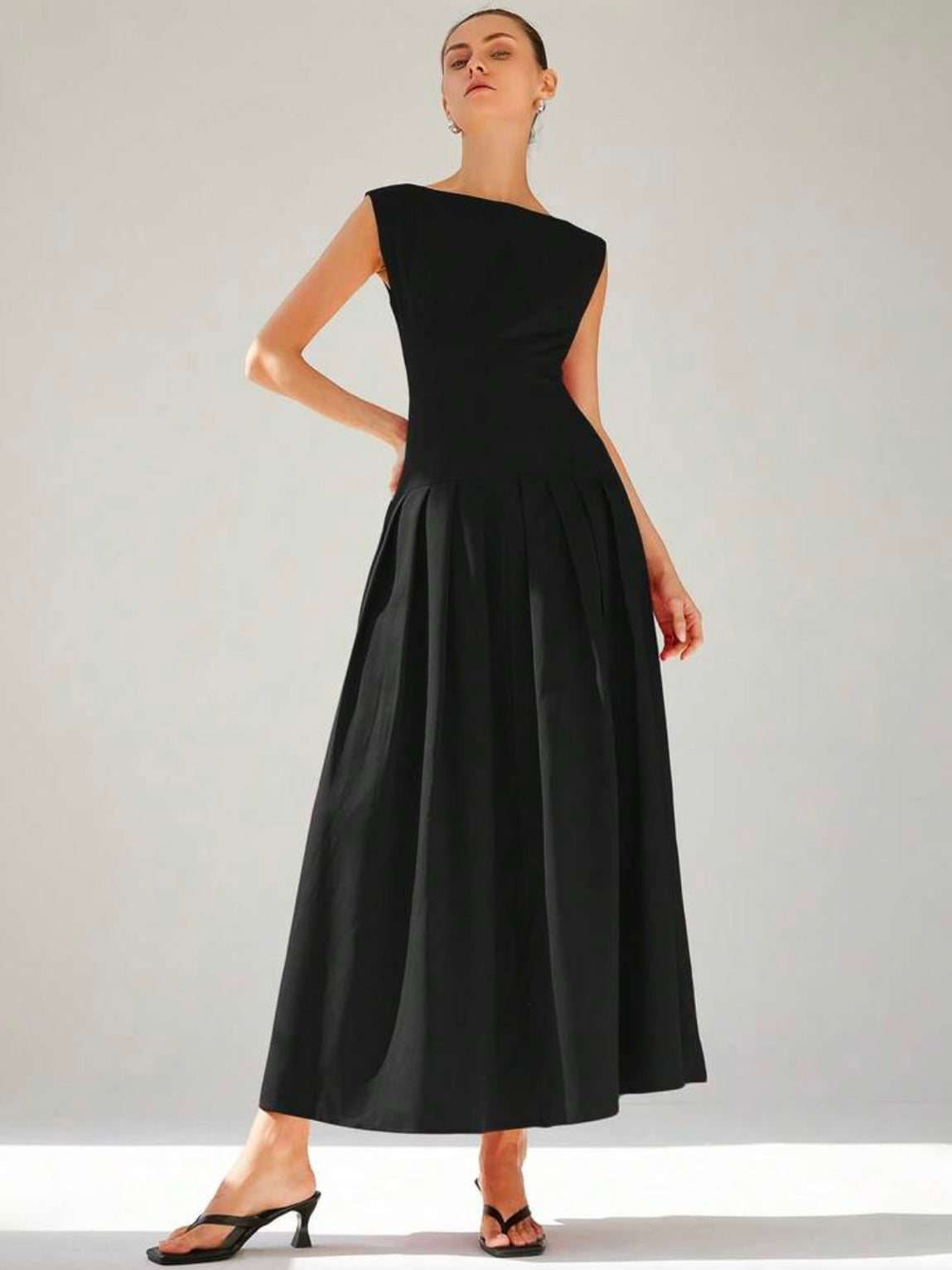 CM-DS136373 Women Elegant Seoul Style Sleeveless Cinched Waist Low Waist Pleated Ruffle Hem Long Dress - Black