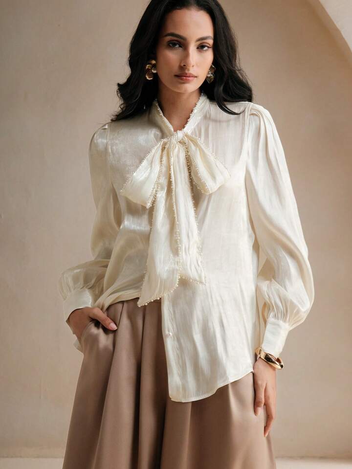 CM-TS379258 Women Elegant Seoul Style Tie Neck Pearl Knot Loose Long Sleeve Blouse - Apricot