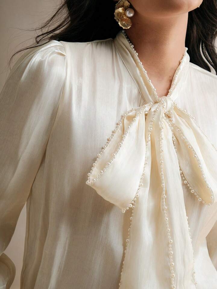CM-TS379258 Women Elegant Seoul Style Tie Neck Pearl Knot Loose Long Sleeve Blouse - Apricot