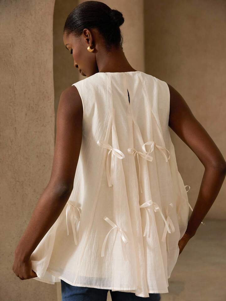 CM-TS342312 Women Elegant Seoul Style Bow Back Sleeveless Loose Splicing Fairy Blouse - Beige