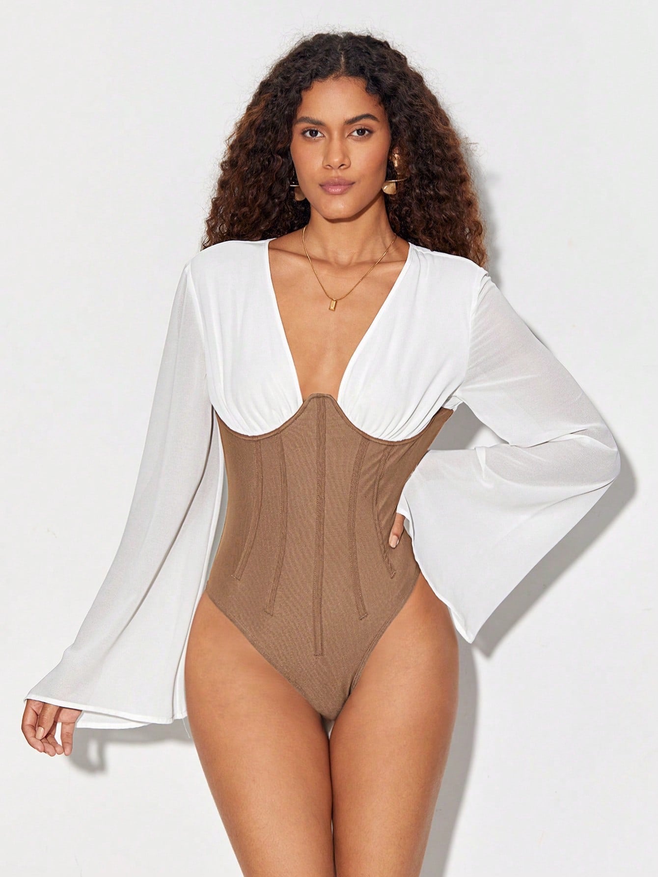 CM-TS152501 Women Elegant Seoul Style Two Tone Plunging Neck Trumpet Sleeve Bodysuit