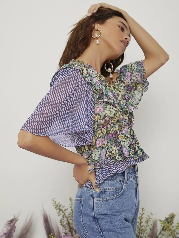 CM-TS430134 Women Casual Seoul Style Asymmetrical Neck Floral Peplum Top