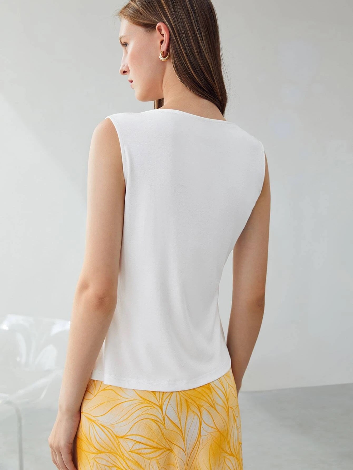 CM-TS522066 Women Elegant Seoul Style Sleeveless Asymmetrical Neck Top - White